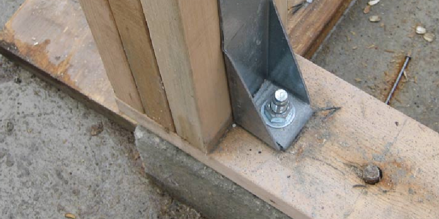How to Secure a Wall to Concrete Floor