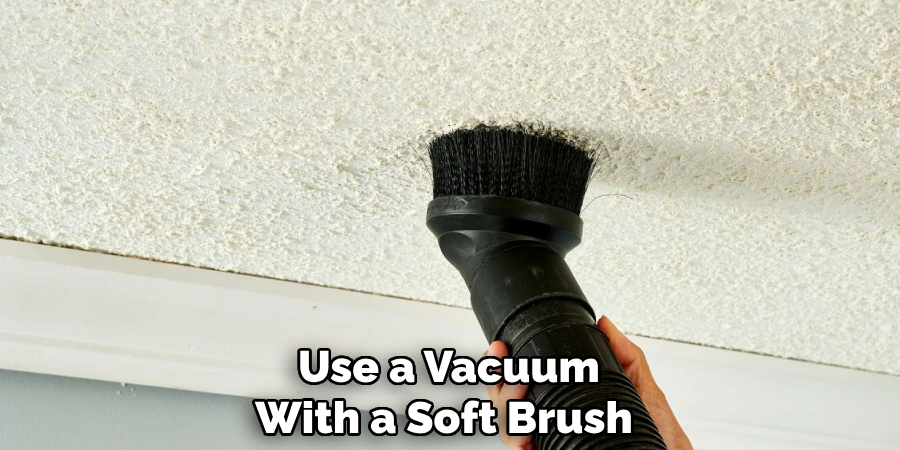 Use a Vacuum With a Soft Brush 